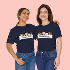 Dog Lover T‑Shirt — "United By Bones" Cute Cartoon Dogs Tee