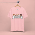 Dog Lover T‑Shirt — "United By Bones" Cute Cartoon Dogs Tee