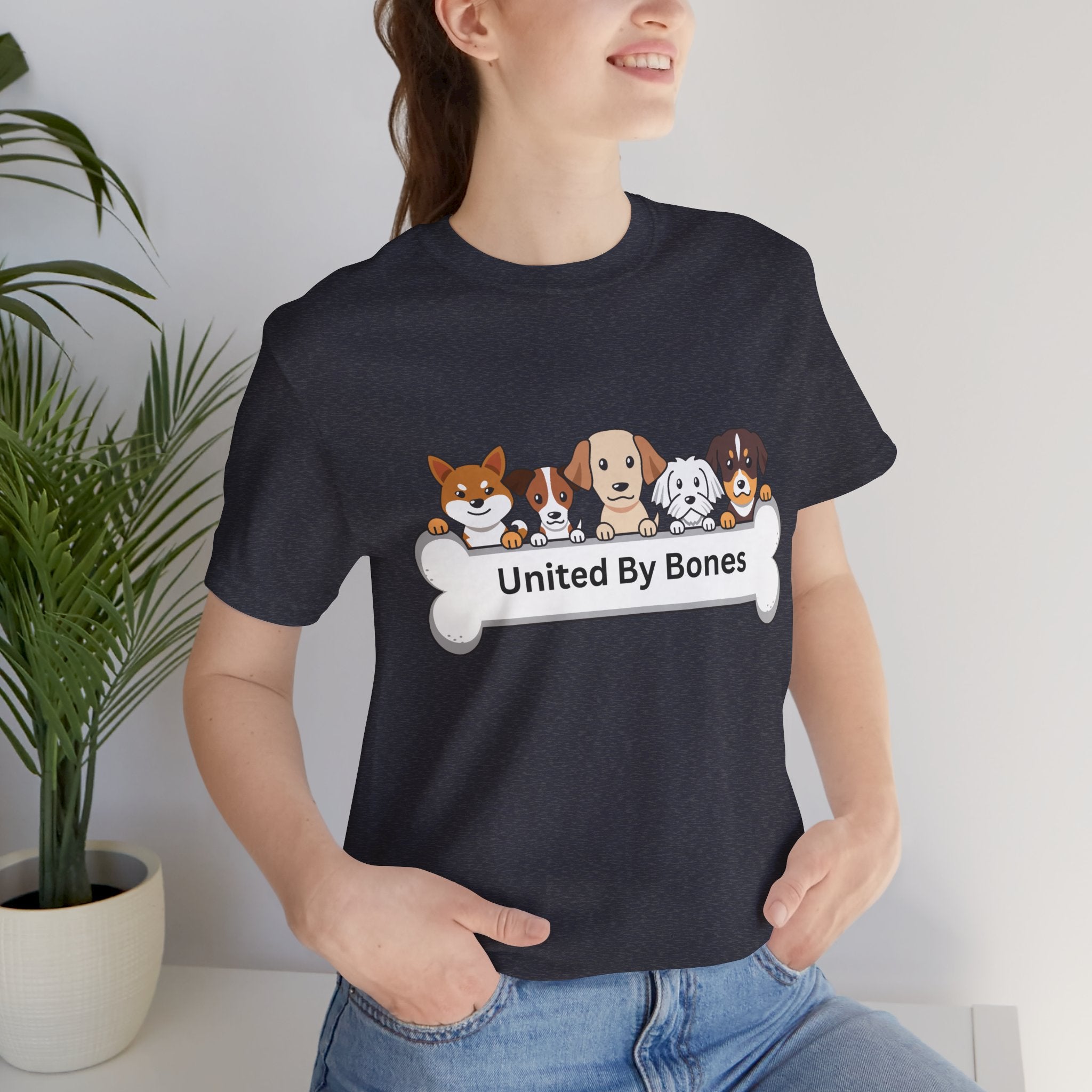 Dog Lover T‑Shirt — "United By Bones" Cute Cartoon Dogs Tee