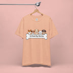 Dog Lover T‑Shirt — "United By Bones" Cute Cartoon Dogs Tee