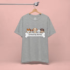 Dog Lover T‑Shirt — "United By Bones" Cute Cartoon Dogs Tee