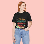 Dog Lover T-Shirt — "This Human Belongs to a Dog" Cute Paw Print Tee
