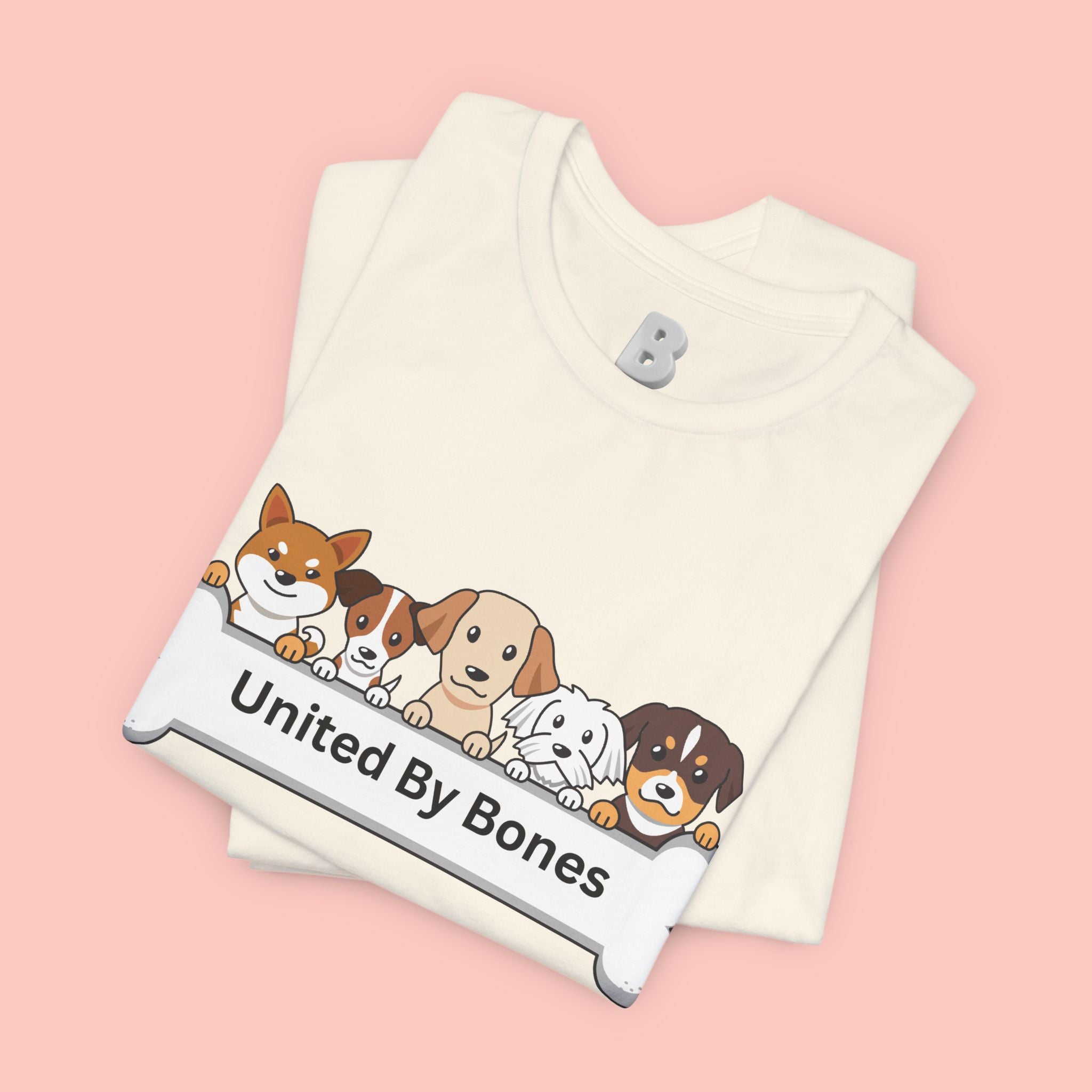 Dog Lover T‑Shirt — "United By Bones" Cute Cartoon Dogs Tee