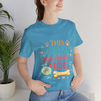 Dog Lover T-Shirt — "This Human Belongs to a Dog" Cute Paw Print Tee