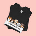 Dog Lover T‑Shirt — "United By Bones" Cute Cartoon Dogs Tee