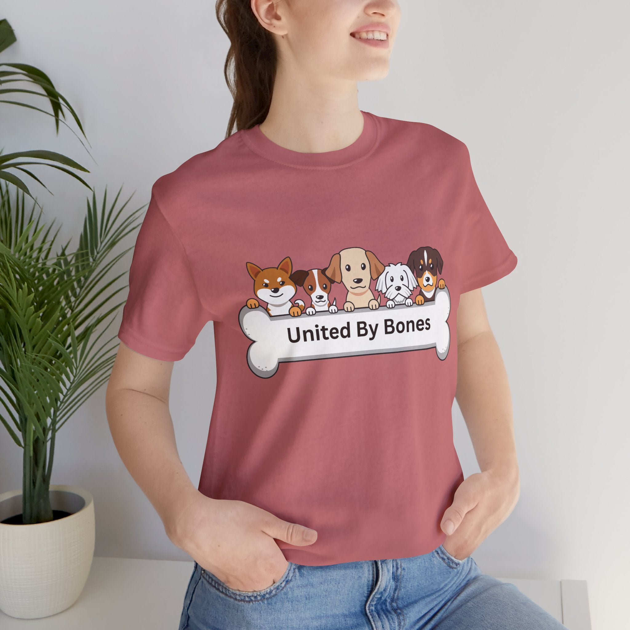 Dog Lover T‑Shirt — "United By Bones" Cute Cartoon Dogs Tee