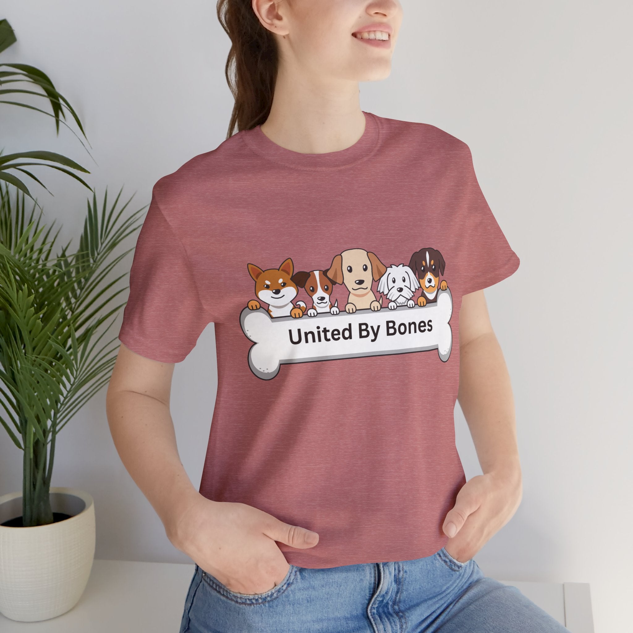 Dog Lover T‑Shirt — "United By Bones" Cute Cartoon Dogs Tee