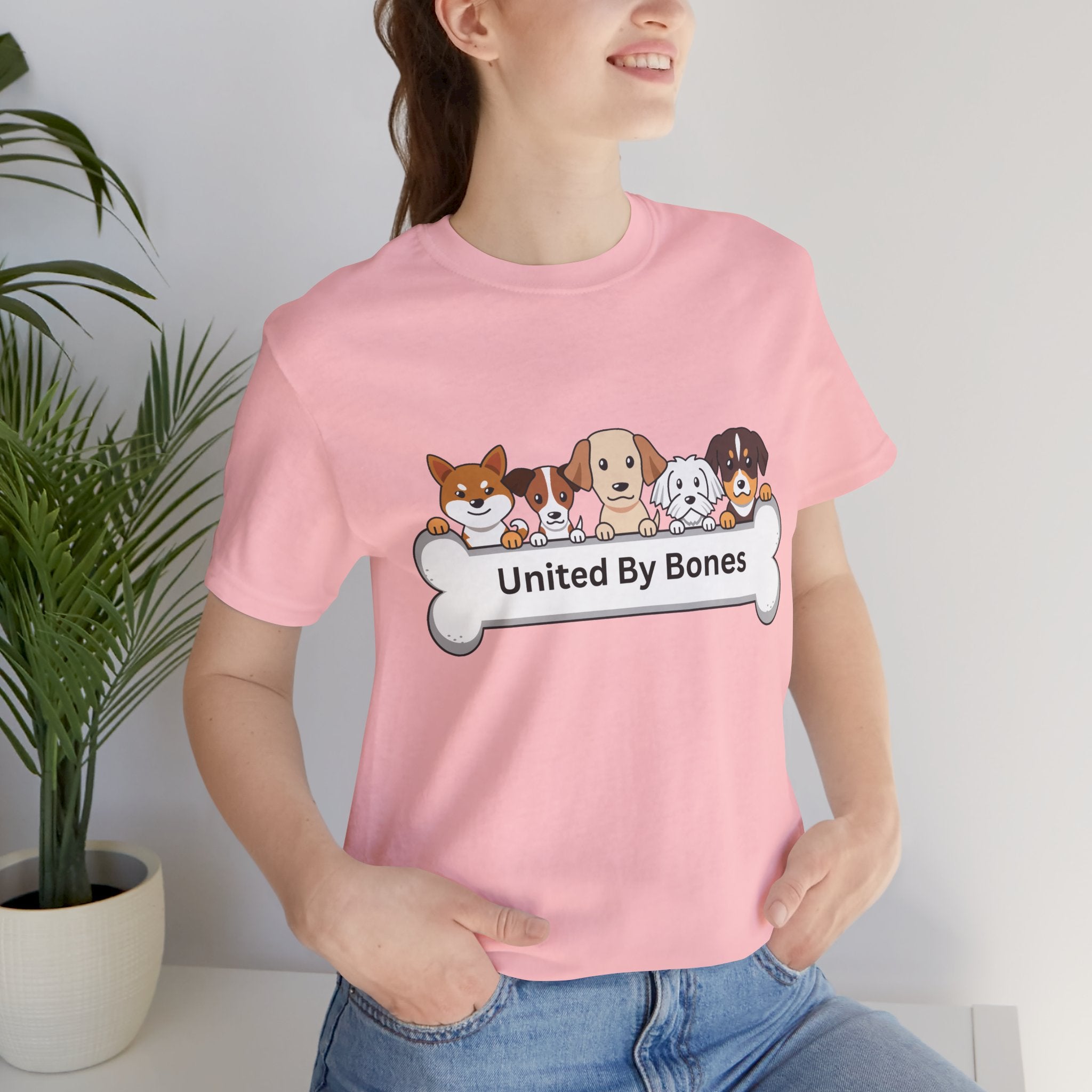 Dog Lover T‑Shirt — "United By Bones" Cute Cartoon Dogs Tee
