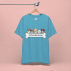Dog Lover T‑Shirt — "United By Bones" Cute Cartoon Dogs Tee